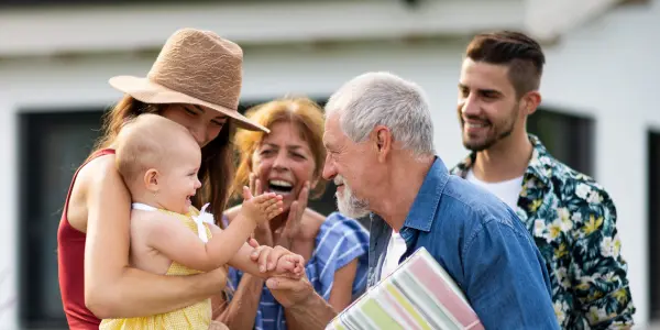 Smiling family reviewing health coverage options